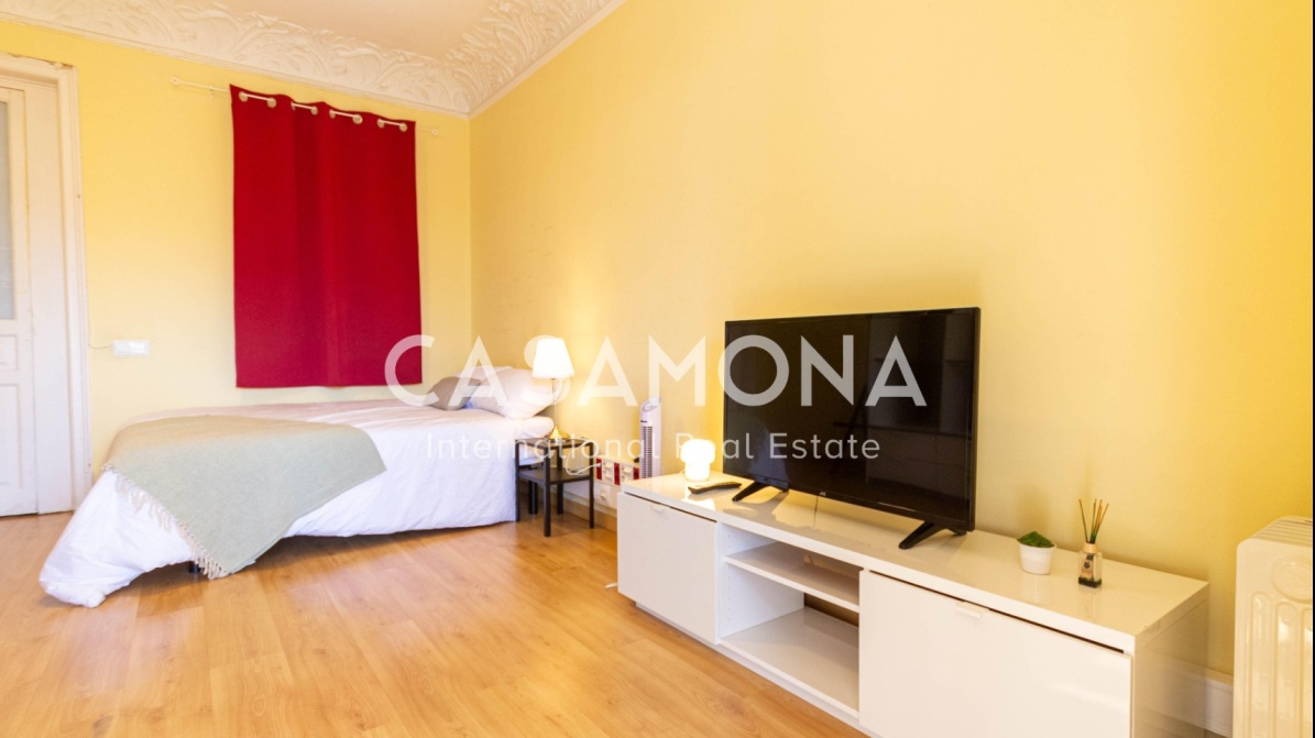 Elegante camera in co-living con letto matrimoniale nell'Eixample