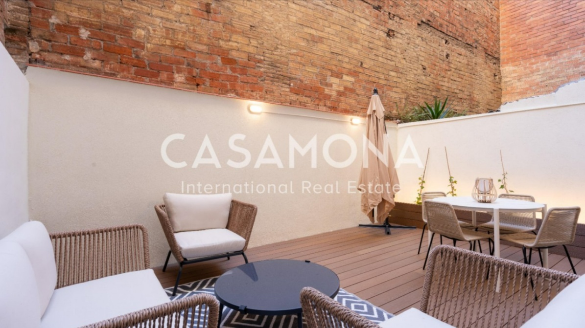 Stylish 1-Bedroom Apartment with Spacious Private Patio Near Sagrada Familia