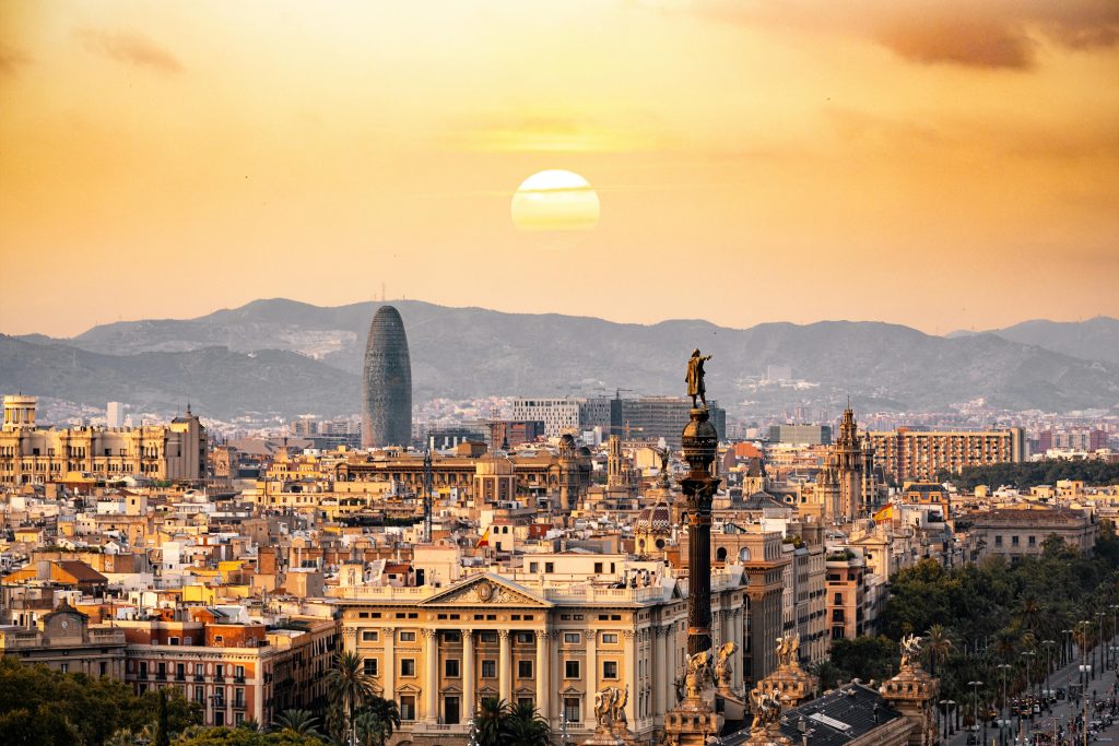 Panoramic view of Barcelona, a picturesque backdrop for the AMERICA'S CUP, highlighting the prime real estate options with the perfect blend of the coastal charm of Barceloneta.